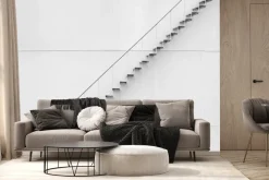 Fototapeta: Metalowe delikatne schody przy białej ścianie