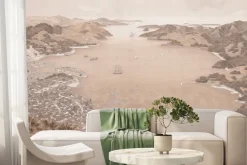 Fototapeta: Miasteczko z górskim horyzontem nad brzegiem morza