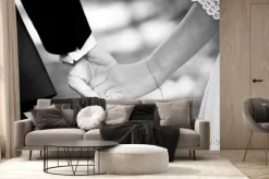 Fototapeta: Młode małżeństwo trzymając się za ręce