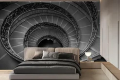 Fototapeta: Monochromatyczne zdjęcie kręconych schodów