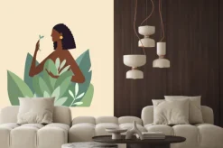 Fototapeta: Naked beautiful young woman in big leaves with dark skin and