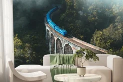 Fototapeta: Niebieski pociąg na moście krajobraz