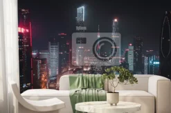 Fototapeta: Panorama miasta z oświetlonymi wieżowcami