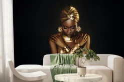 Fototapeta: Photo portrait closeup fantasy african woman face in gold paint.