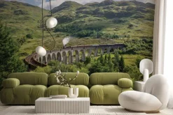 Fototapeta: Pociąg jadący po moście wśród gór