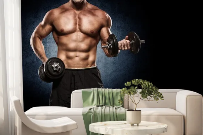 Fototapeta: Przystojny mężczyzna z dużymi mięśniami, stwarzających na aparat