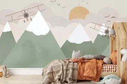 Fototapeta: Samoloty lecące wśród gór i chmur