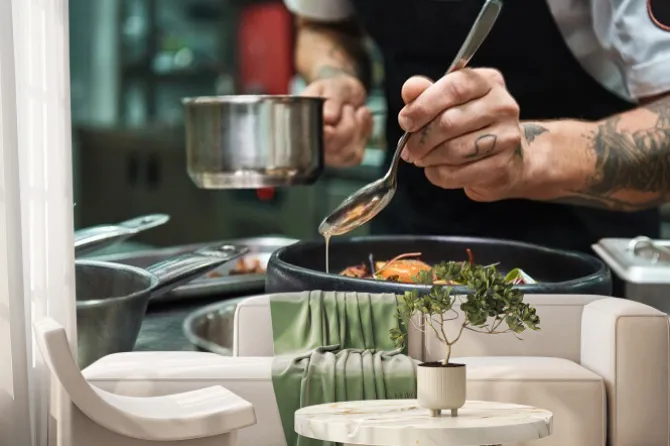 Fototapeta: Secret recipe. close up photo of chef hands with several tattoos