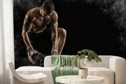 Fototapeta: Sportowiec umięśniony ćwiczy z kettlebell