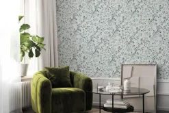 Fototapeta: Subtelne zielone gałązki z liśćmi