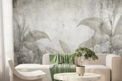 Fototapeta: Tropikalne liście na popękanej starej ścianie