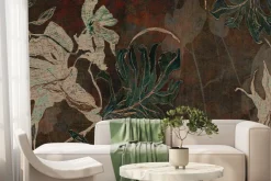 Fototapeta: Tropikalne liście na brązowej teksturze