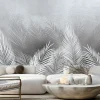 Fototapeta: Tropikalne liście palmy w bieli i szarości z efektem betonu
