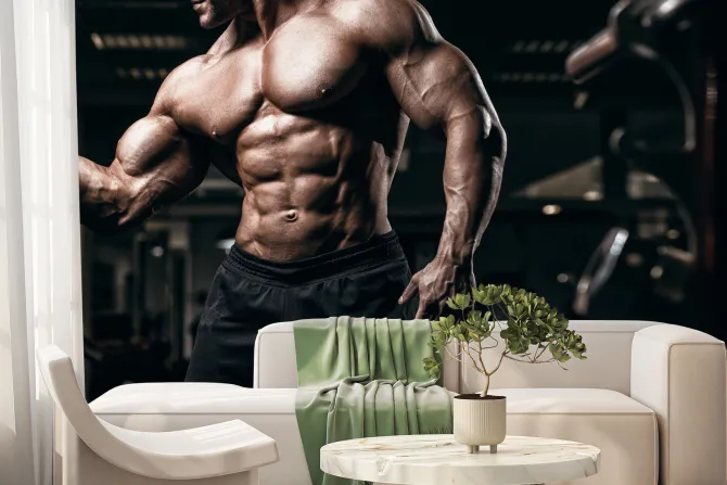 Fototapeta: Umięśniony kulturysta trenuje na siłowni