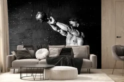 Fototapeta: Umięśniony mężczyzna trenujący z kettlebell