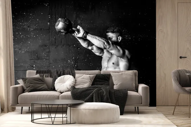 Fototapeta: Umięśniony mężczyzna trenujący z kettlebell