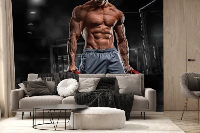 Fototapeta: Umięśniony mężczyzna z ciężarami