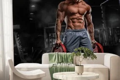 Fototapeta: Umięśniony mężczyzna z ciężarami