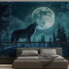 Fototapeta: Wilk na zboczu góry wśród drzew i pełni księżyca