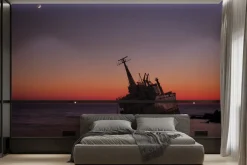Fototapeta: Wrak statku na morzu przy zachodzie słońca