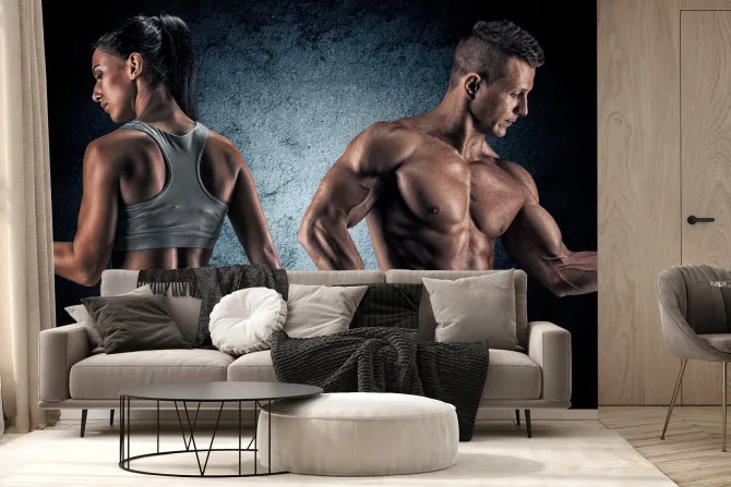 Fototapeta: Wysportowana kobieta i mężczyzna z ciężarami