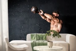 Fototapeta: Young strong sweaty focused fit muscular man with big muscles