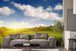 Fototapeta: Zachód słońca nad polaną z rzeką