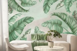 Fototapeta: Zielone liście palmy na betonie