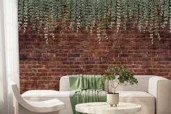 Fototapeta: Zielone rośliny zwisające na tle ceglanego muru