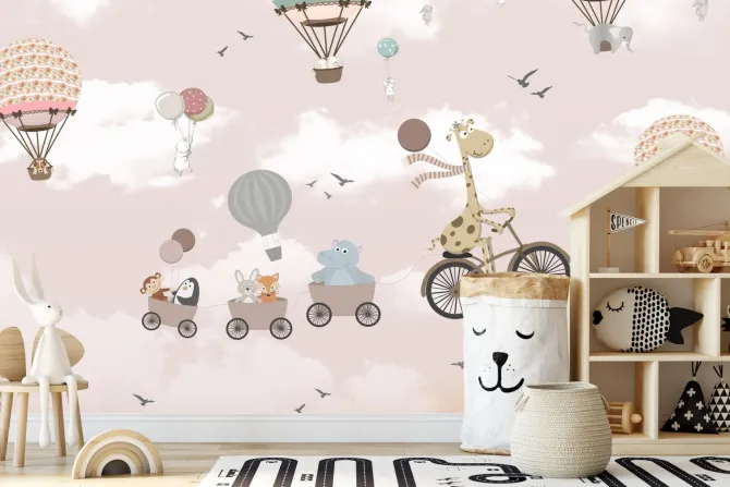 Fototapeta: Zwierzątka w pojazdach i balony na tle różowego nieba