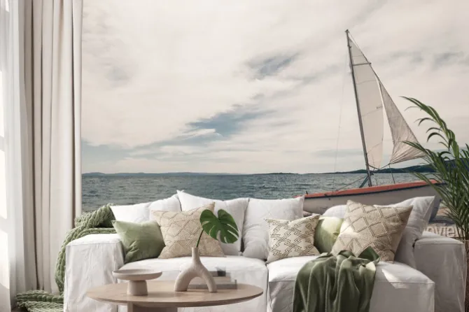 Naklejka: Żaglowiec na tropikalnej plaży z niebieskim tle wody