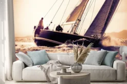 Naklejka: Żaglówka na morzu o zachodzie słońca