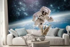 Naklejka: Astronauta w kosmosie na tle ziemi