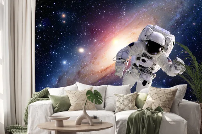 Naklejka: Astronauta w kosmosie na tle galaktyki