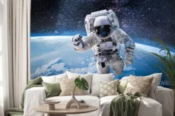 Naklejka: Astronauta w przestrzeni kosmicznej z panoramą ziemi