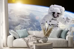 Naklejka: Astronauta w przestrzeni, w tle nasz ziem słońce - elementy tego