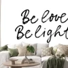 Naklejka: Be love and light ink pen vector lettering. hippie phrase, positive
