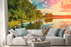 Naklejka: Brzegu rzeki z drzew o zachodzie słońca