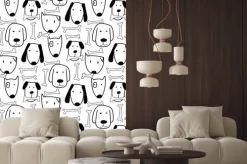 Naklejka: Czarne zarysy piesków i kości na białym tle