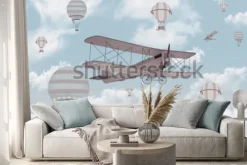 Naklejka: Dwupłatowiec i balony na tle chmur