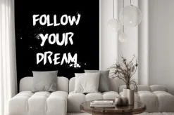 Naklejka: Follow your dream quotes tshirt design. brush stroke font style.