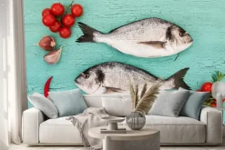 Naklejka: Fresh dorado ryba z warzywami na niebieskim stole. kopia przestrzeń,