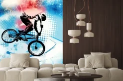 Naklejka: Ilustracja z rowerzystą na przednim kole