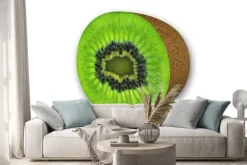 Naklejka: Kiwi w plasterkach, owoc pokrojony w połowie na białym tle