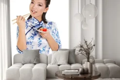 Naklejka: Kobieta sushi gospodarstwa sushi z pałeczki