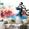 Naklejka: Kolorowe tło z rowerzystą bmx