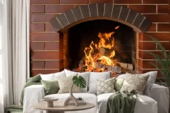Naklejka: Kominek z czerwonej cegły z płomieniami