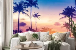 Naklejka: Letni krajobraz palmy na tle kolorowego nieba o zachodzie słońca