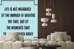 Naklejka: Life is not measured by the number of breaths we take, but by