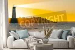 Naklejka: Lighthouse with light beam on ocean